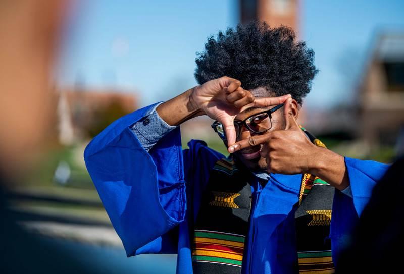 GVSU student on the Allendale campus after Commencement.